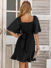 Load image into Gallery viewer, Blair Smocked Tie Back Ruffle Hem Dress