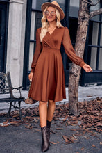 Load image into Gallery viewer, Gabrielle Surplice Neck Swiss Dot Long Sleeve Dress